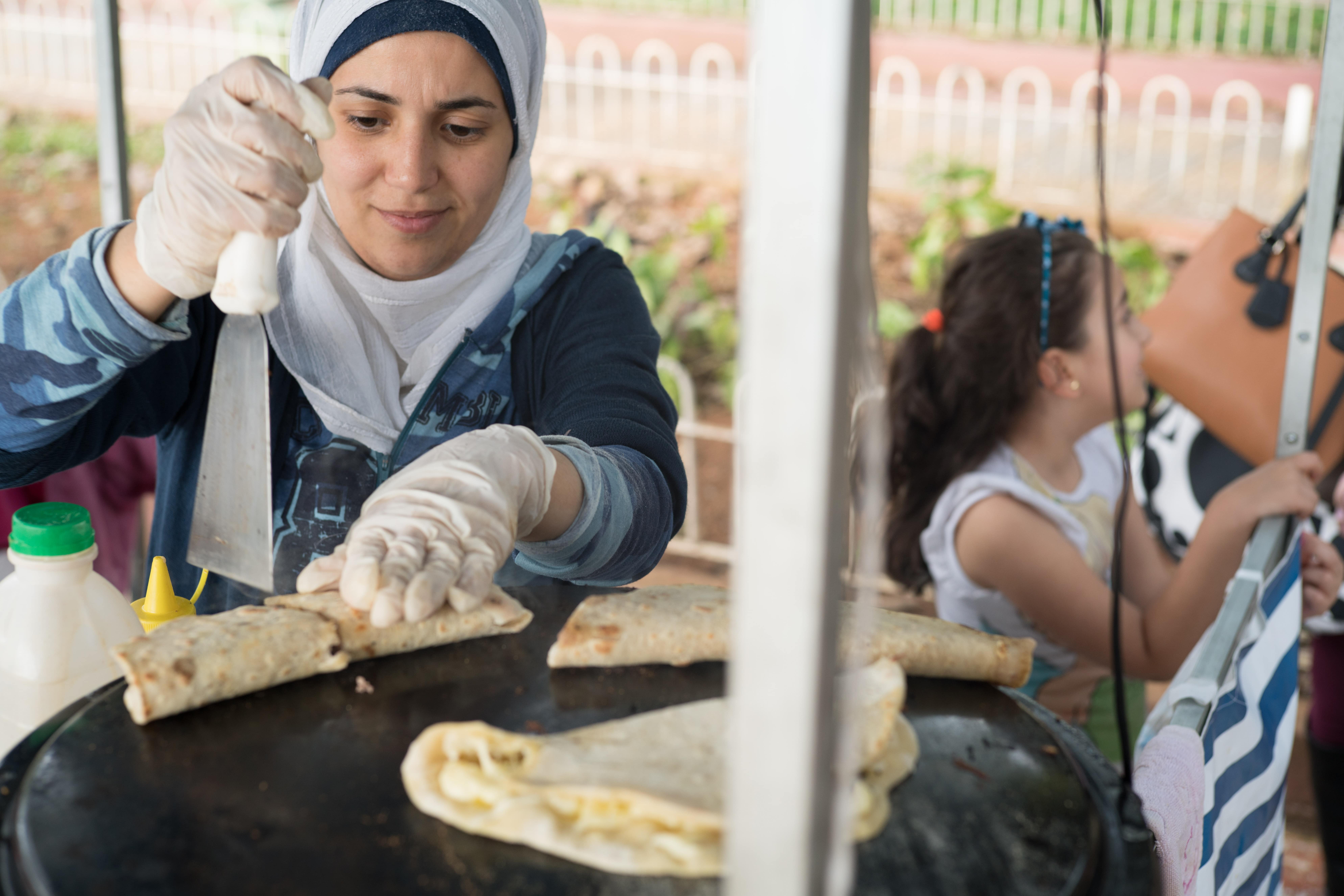 Syrian refugee Salsabil cooks typical Arabic dishes in Brazil. 