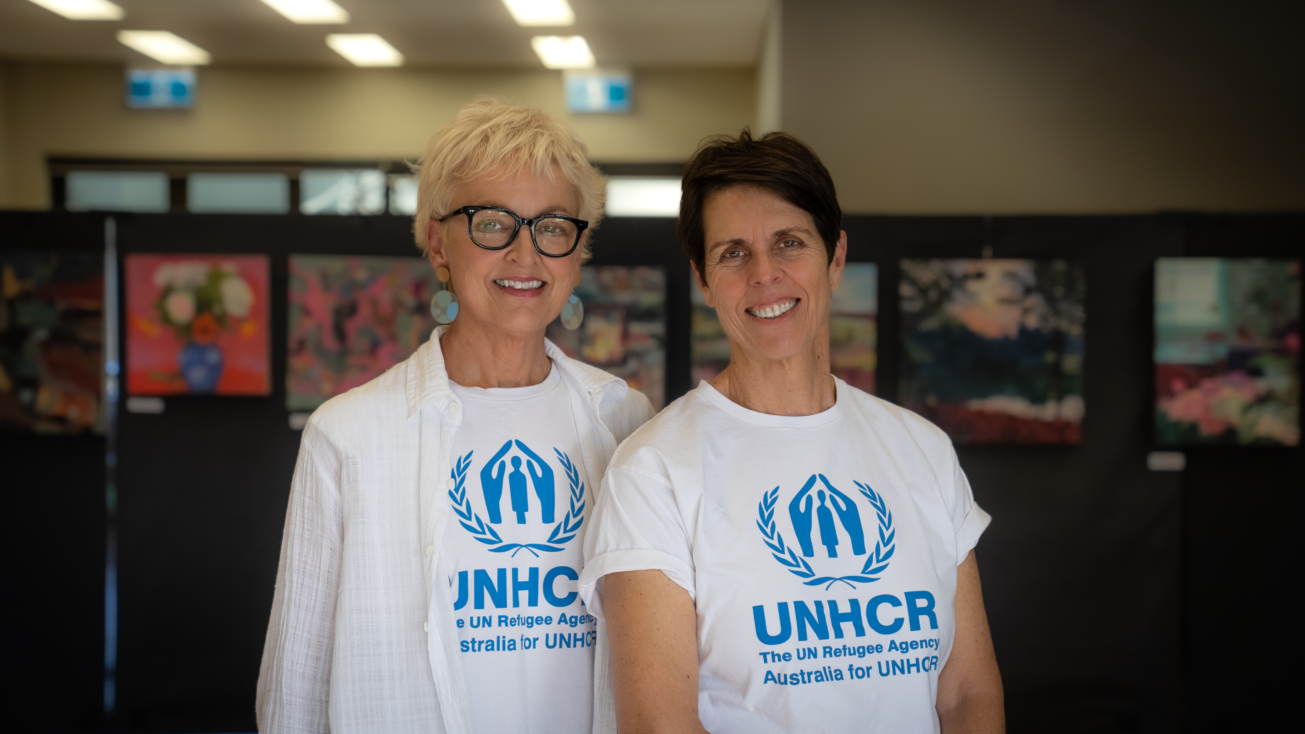 Fundraisers, Mary Lou and Therese wear UNHCR shirts