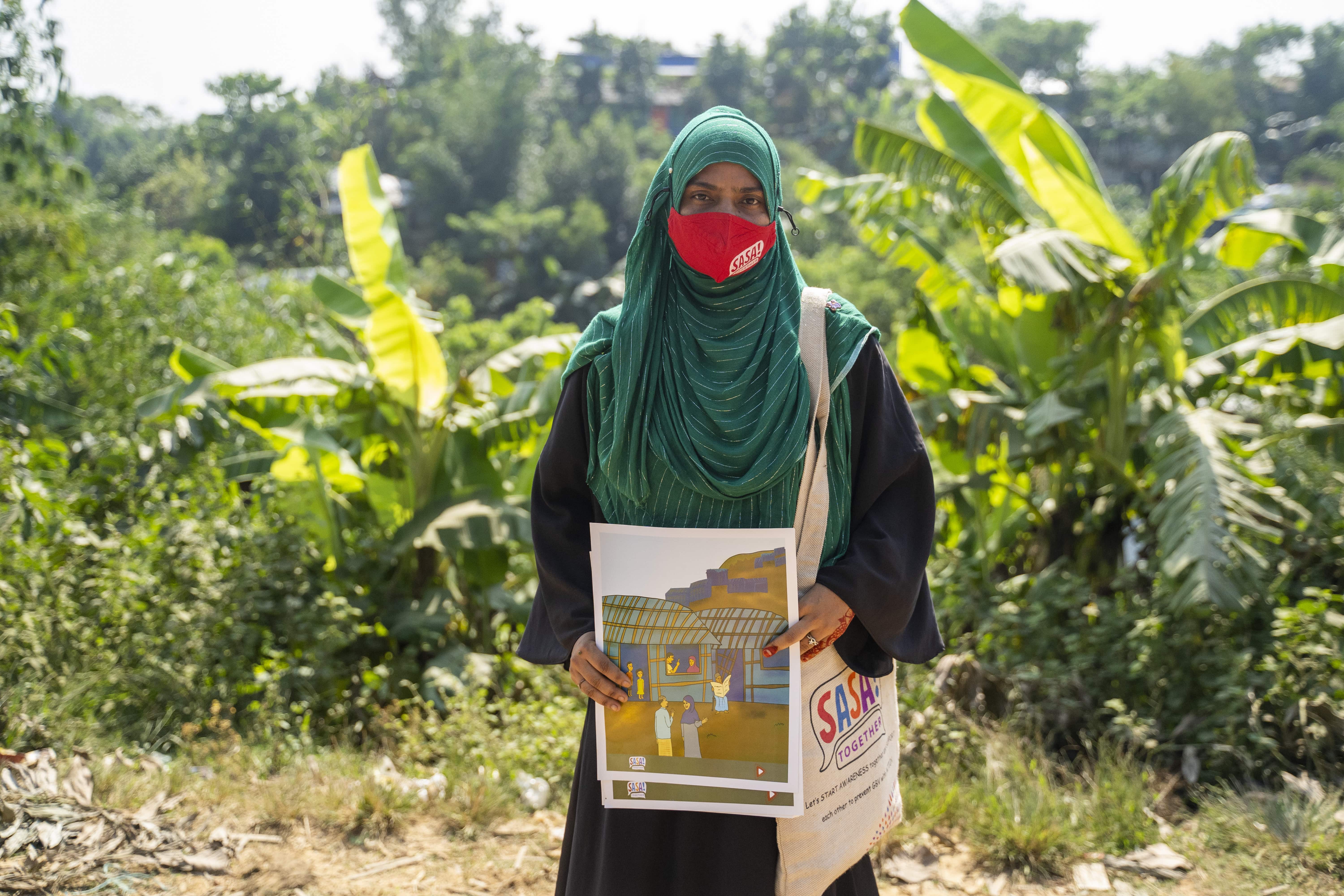 Rohingya refugee and community outreach volunteer Beauty Akther works with Rohingya women to raise awareness about gender-based violence in Kutupalong refugee camp in Cox’s Bazar, Bangladesh