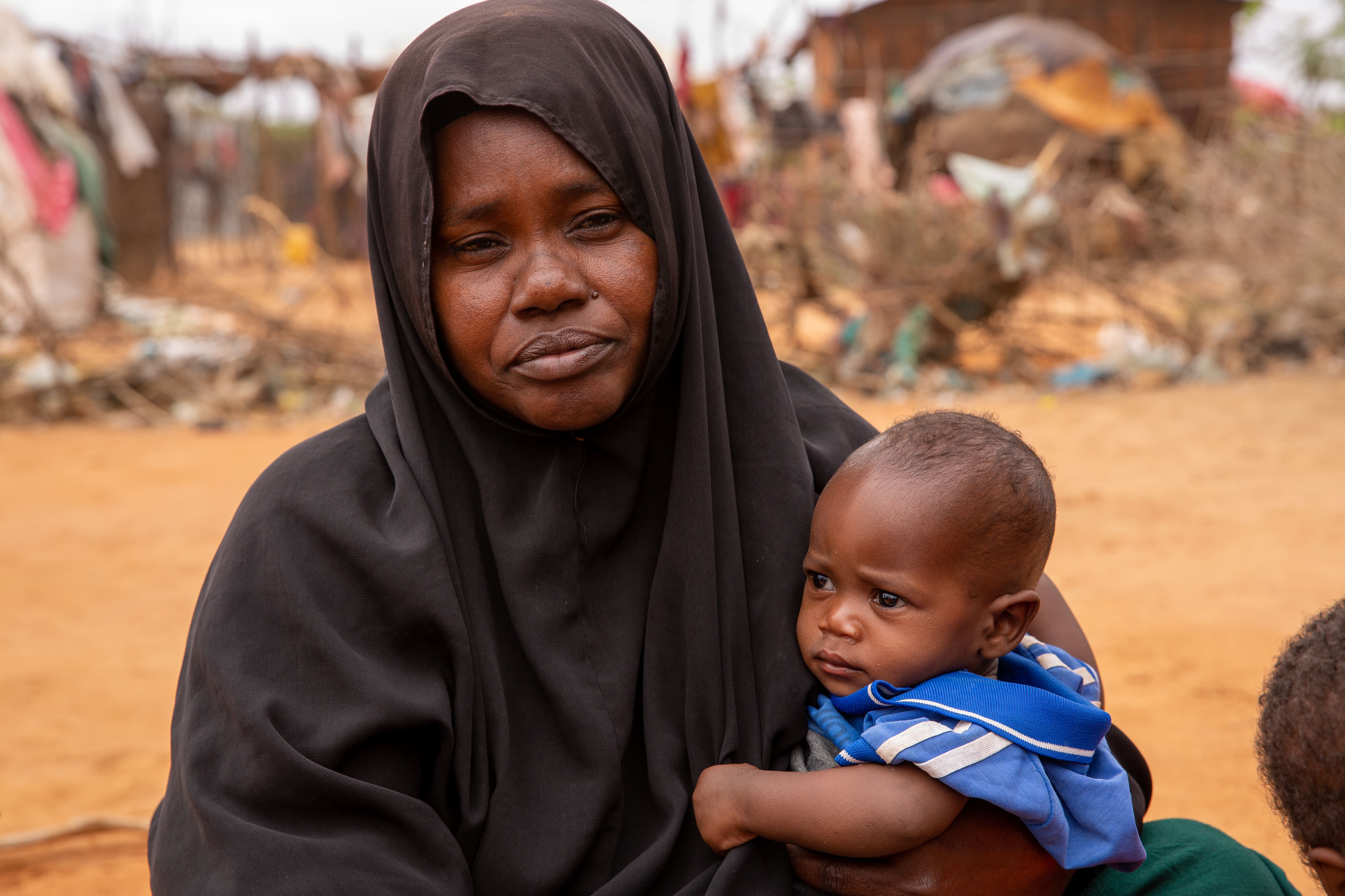 Shamsa Amina Ali with one of her children