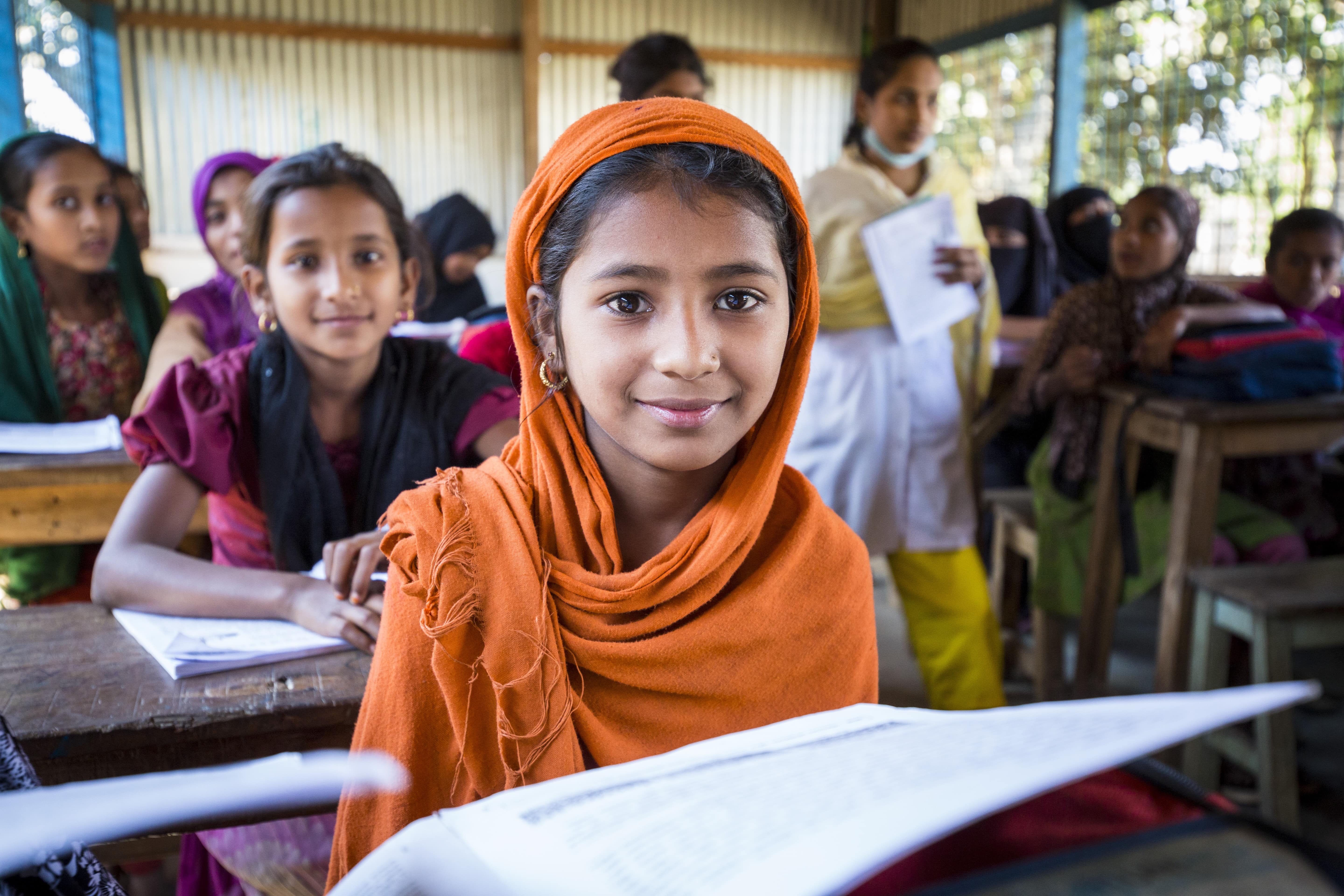 Rohingya refugee student Nur Fatima, 11, attends a school funded by UNHCR in Kutupalong camp. 
