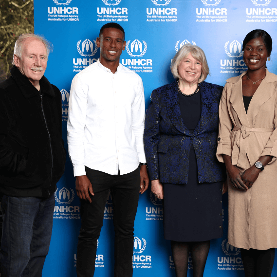 Akec with Cricket legend Ian Chappell, Australian soccer player Golgol Mebrahtu, and Australia for UNHCR National Director Naomi Steer at the annual World Refugee Day luncheon