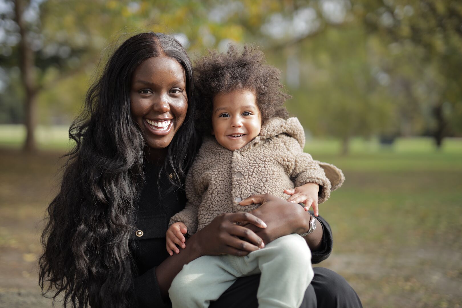  Paraman Tot and her son Forrest are pictured sitting together in a park